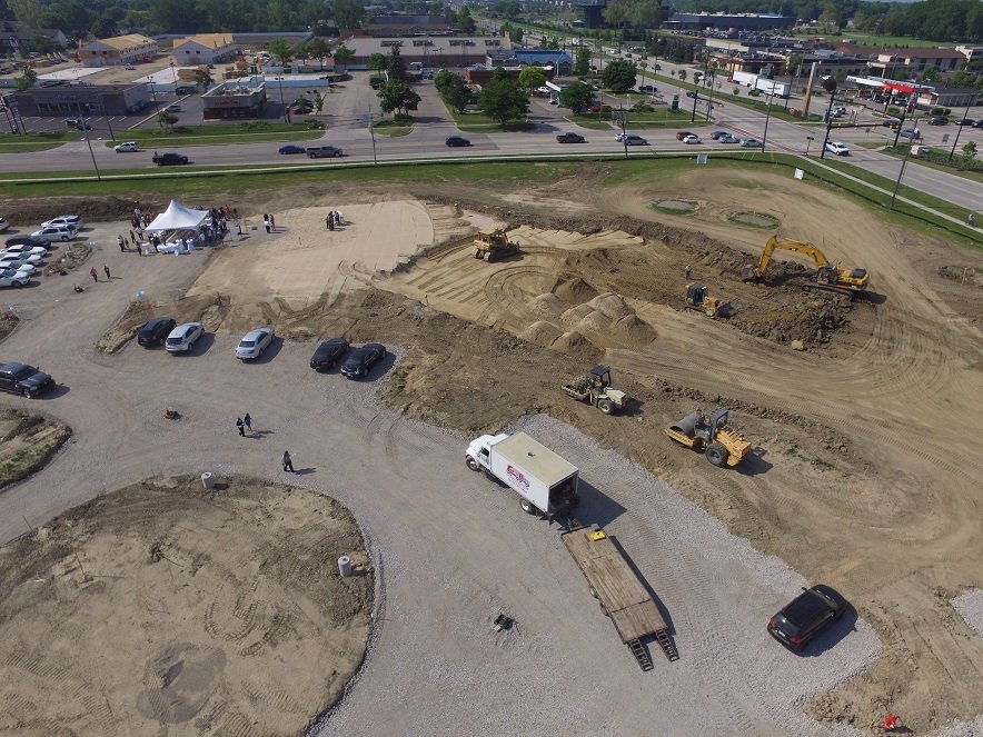 Site Overview of Employees Gathering in Tent